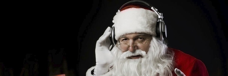 usr_img/101368492/184928__new-year-santa-claus-headphones-listening-to-music-sheet-music-a-dark-background_p.jpg